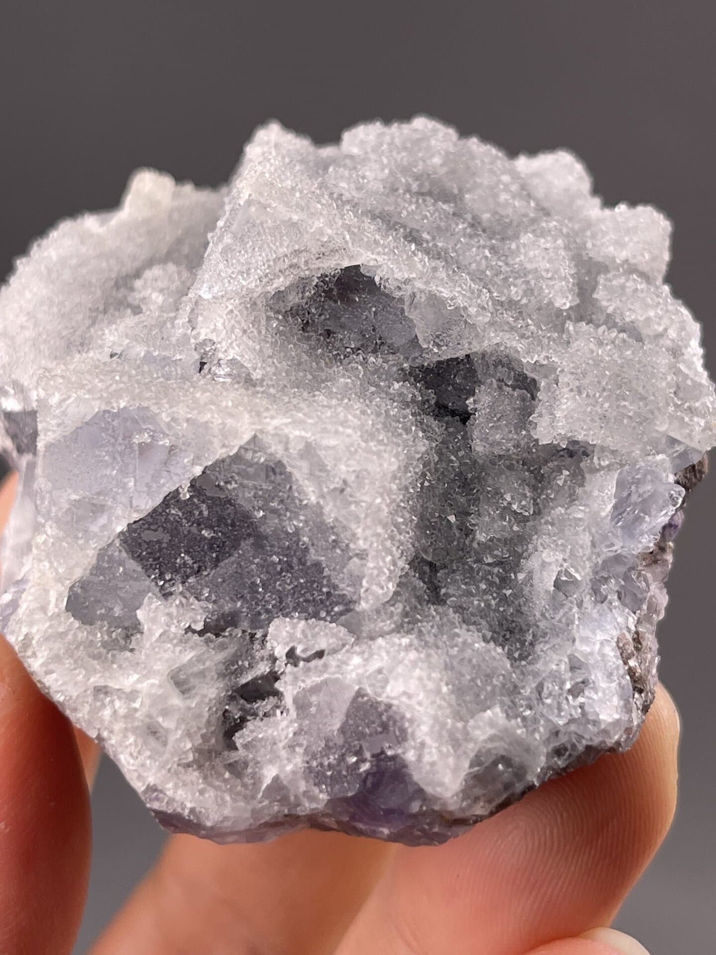 Angled view of Fujian fluorite cluster highlighting cubic geometry