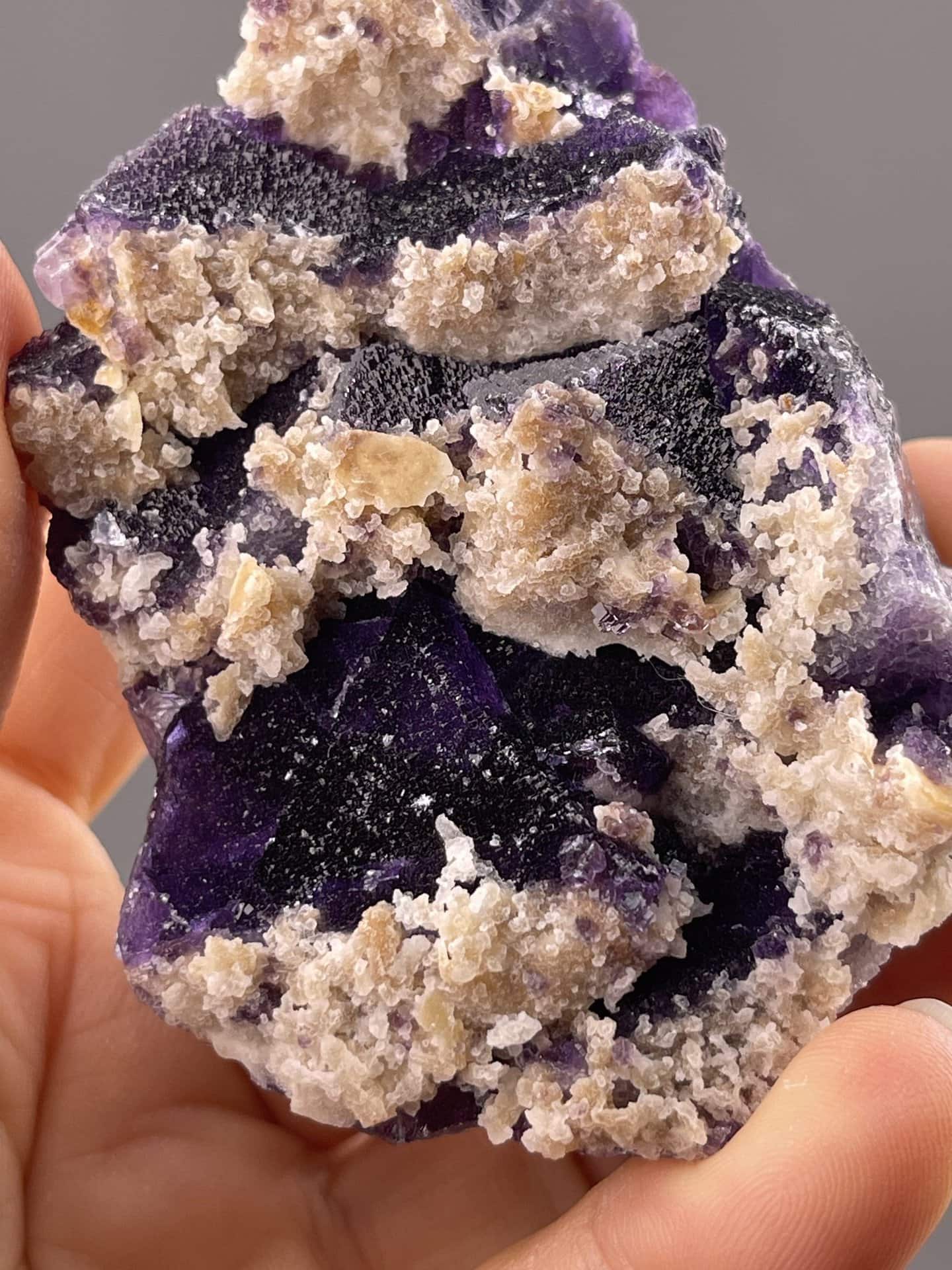 Rich purple fluorite crystals showing deep colour and vitreous surfaces, 3.7 g