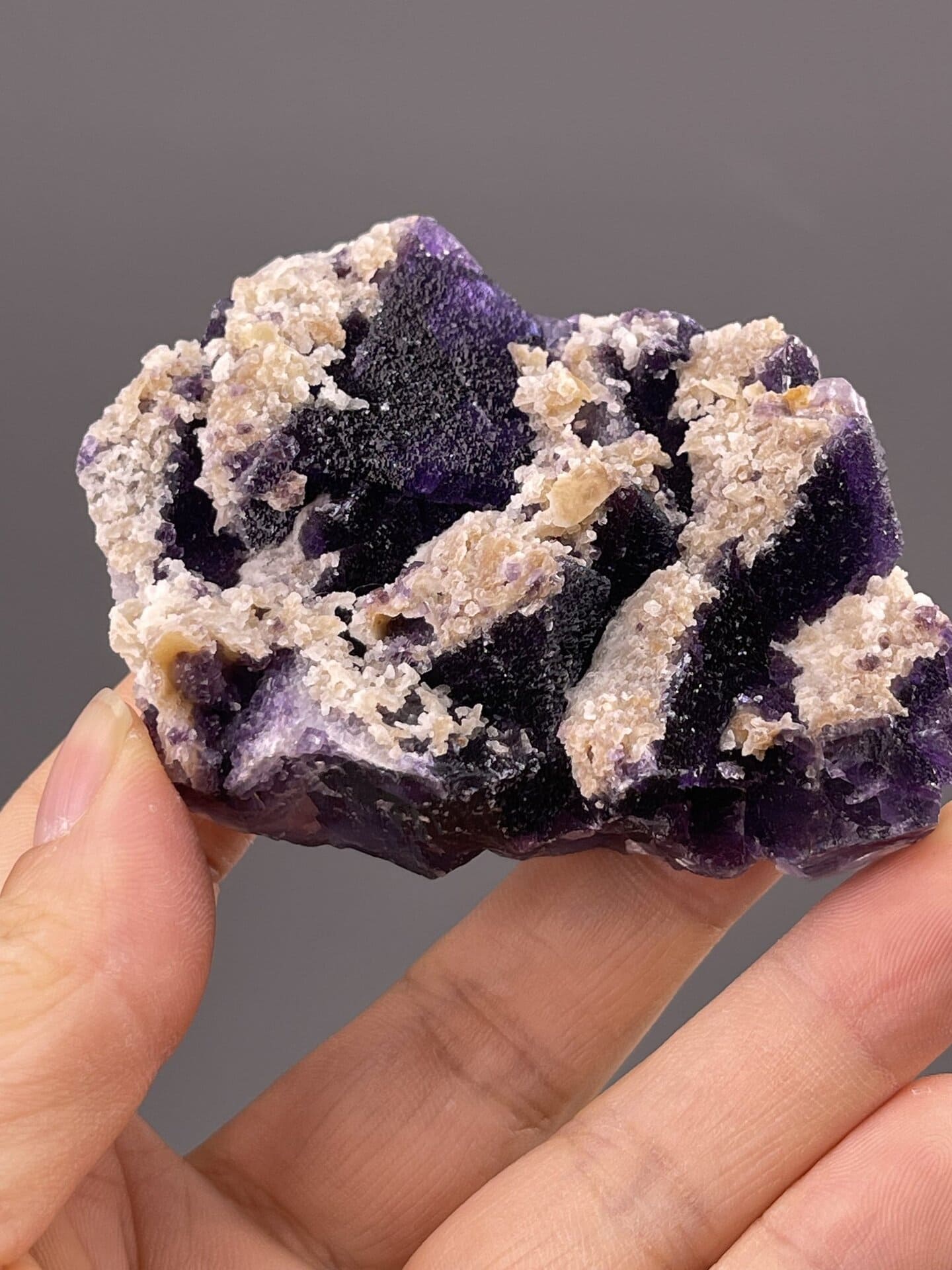 Front view of fluorite cluster, 26×9×21 mm, Guizhou Province
