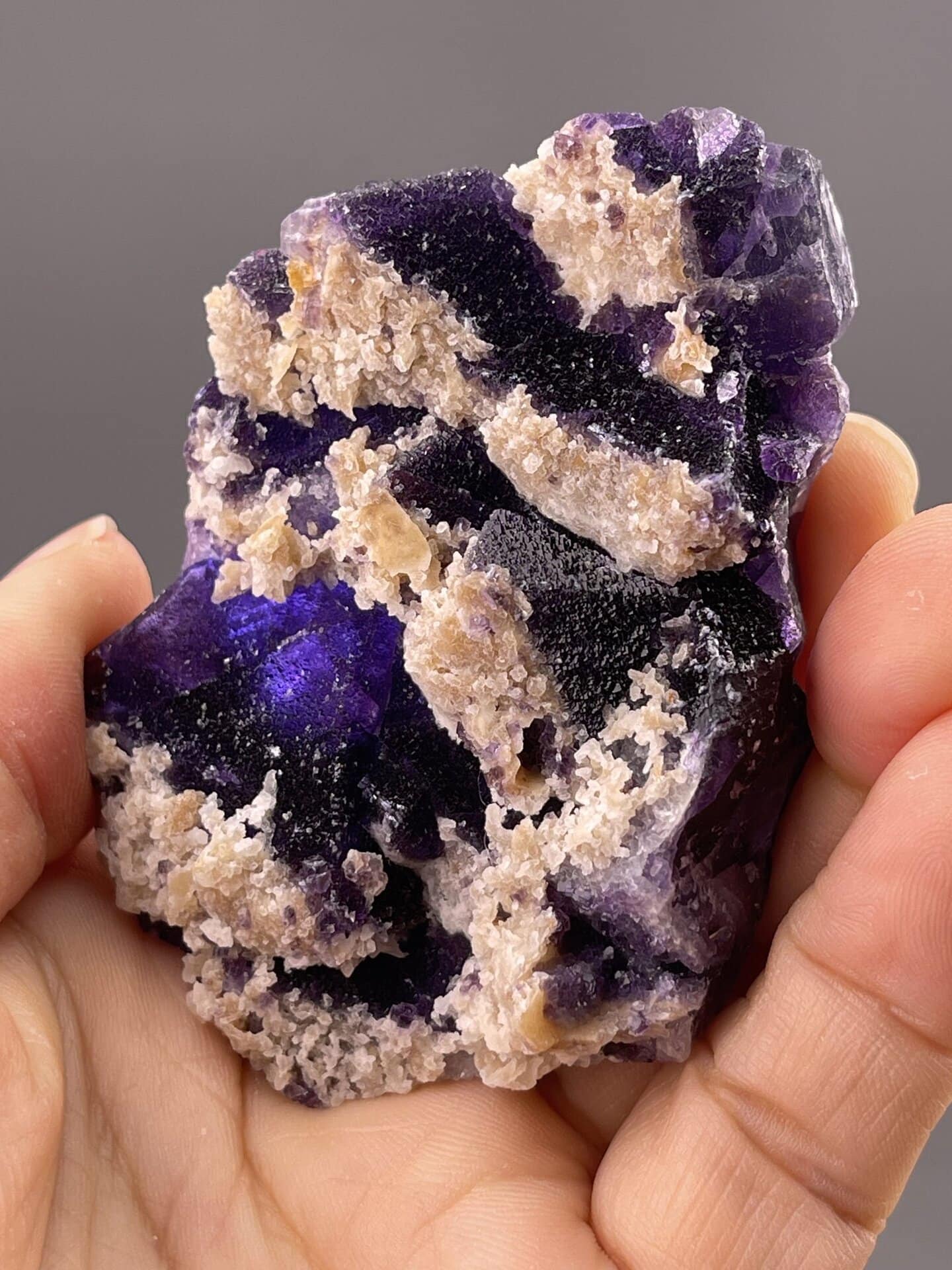 Detail of fluorite showing vitreous luster and deep purple tone