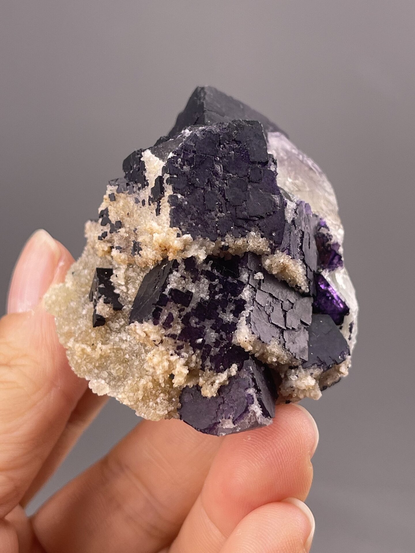 Cubic Fluorite Specimen from Anshun, China – angled view showing matrix