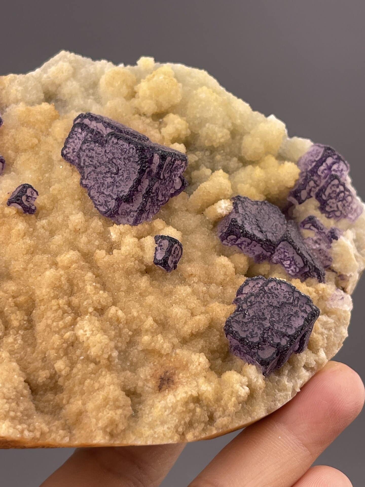 Close-up of purple fluorite showing deep colour and sharp cubic faces