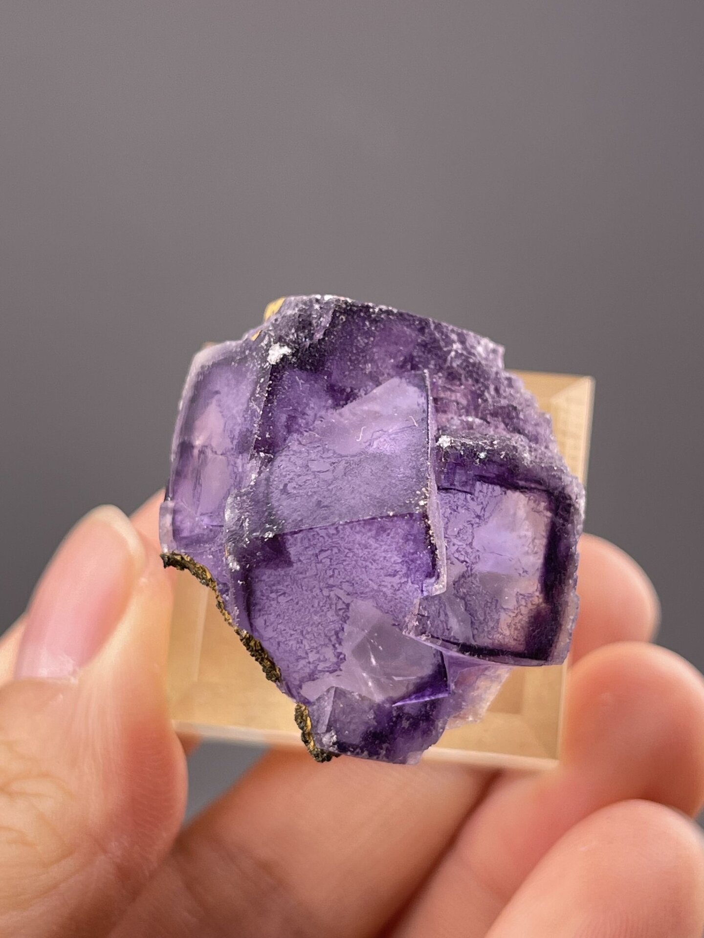 Well-formed purple fluorite cube showing colour and transparency, 0.9 g