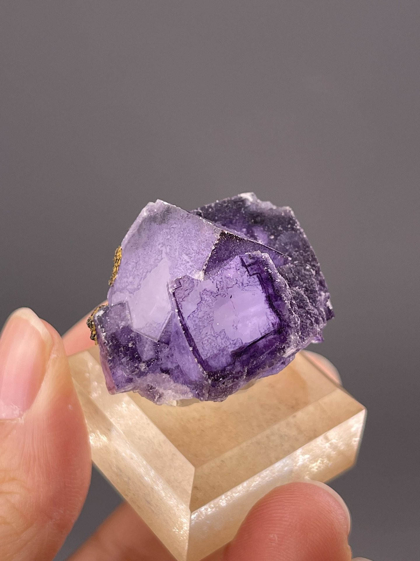 Close-up of cubic fluorite faces showing purple translucency