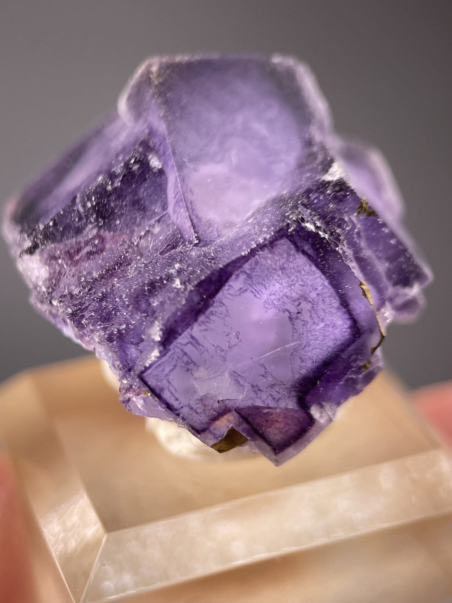 Angled view of Yaogangxian fluorite cube showing colour depth