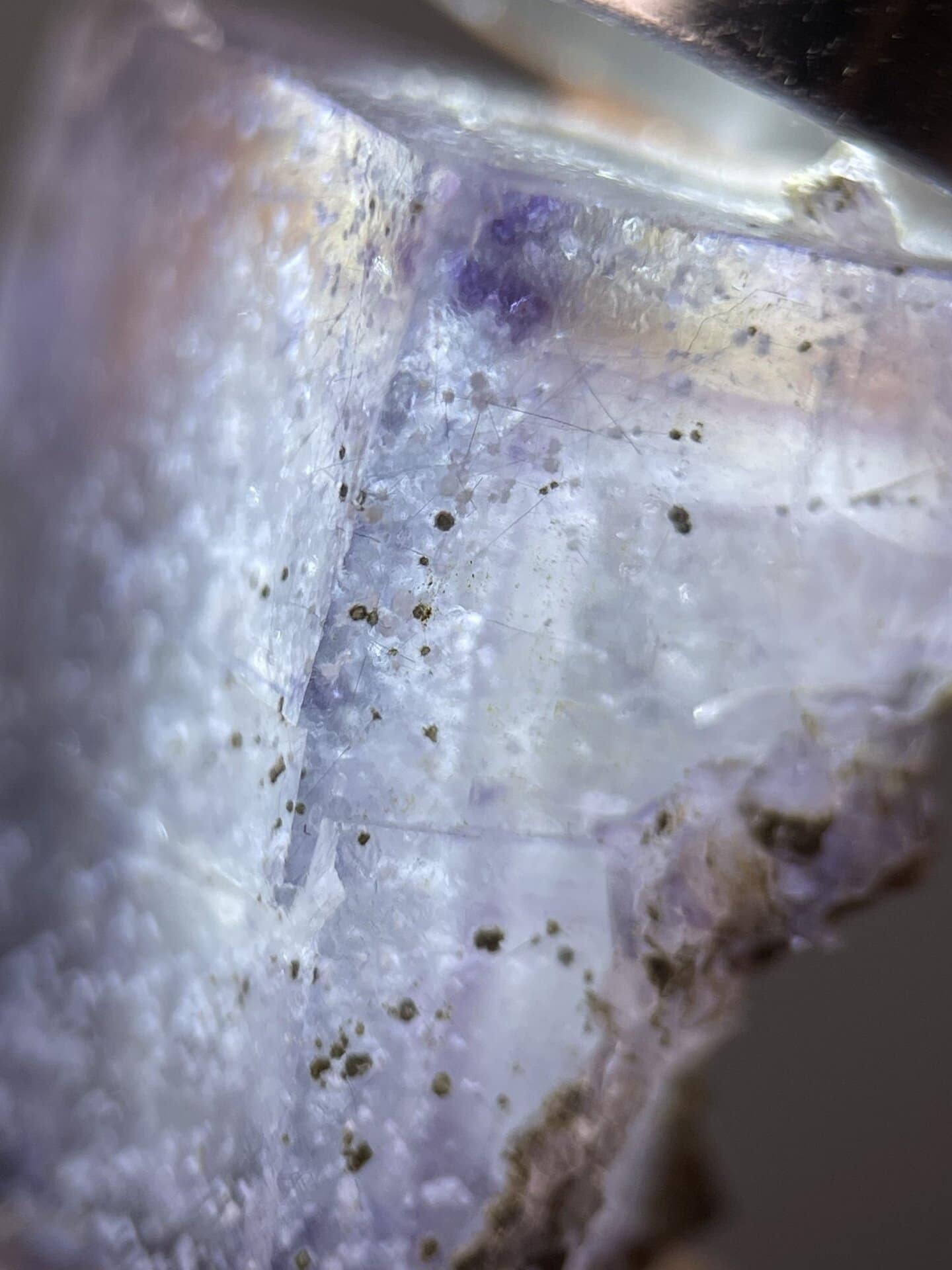 Well-formed purple fluorite cube showing vivid colour, 0.9 g