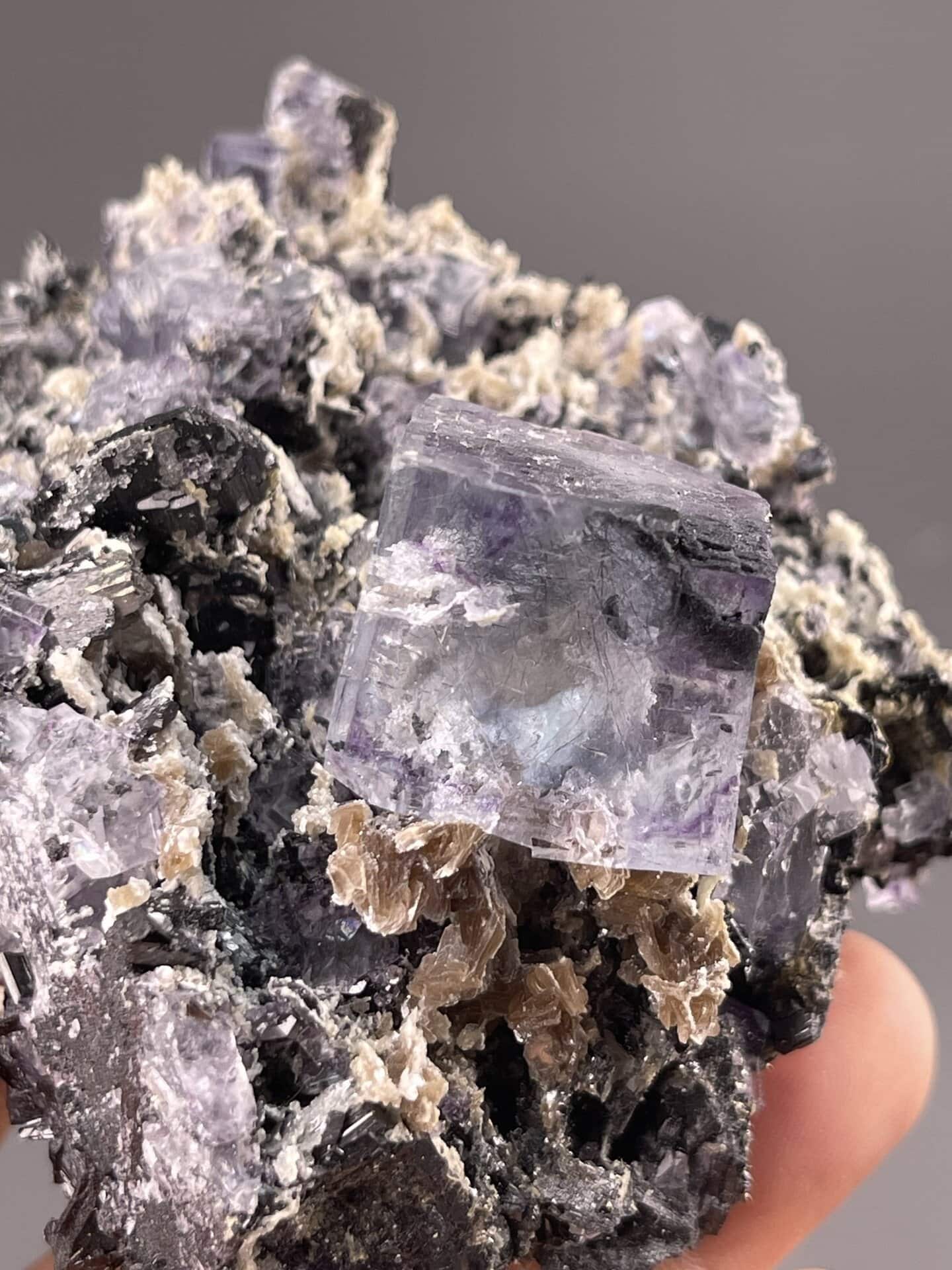 Purple Fluorite Crystals with Phantom Zones from Yaogangxian – close-up of crystal surface