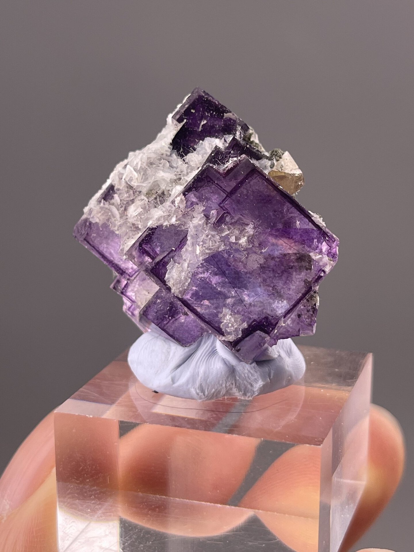 Purple Fluorite Crystals from Yaogangxian Mine, China – angled view showing matrix