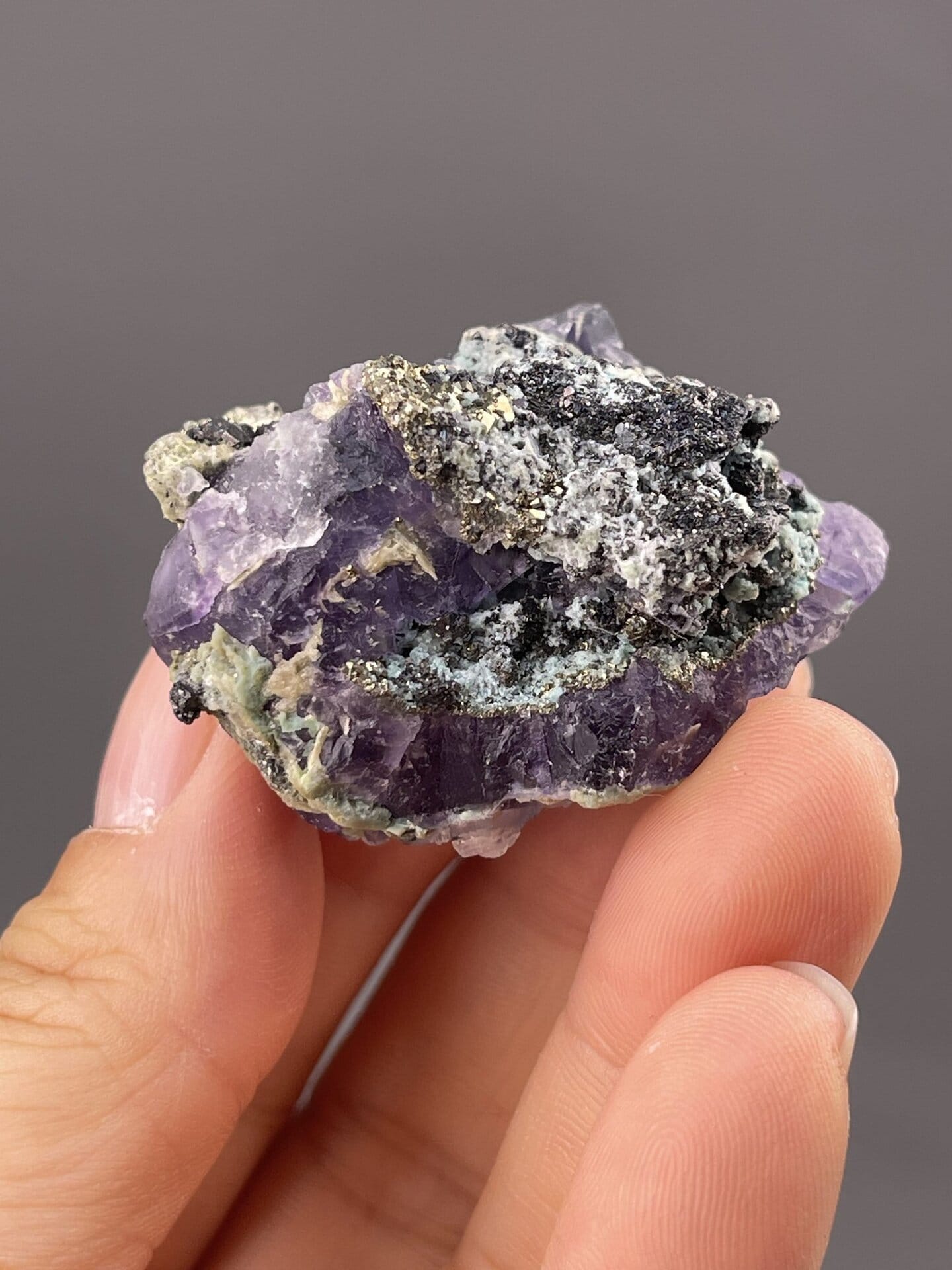 Angled view of Yaogangxian phantom fluorite highlighting colour zones