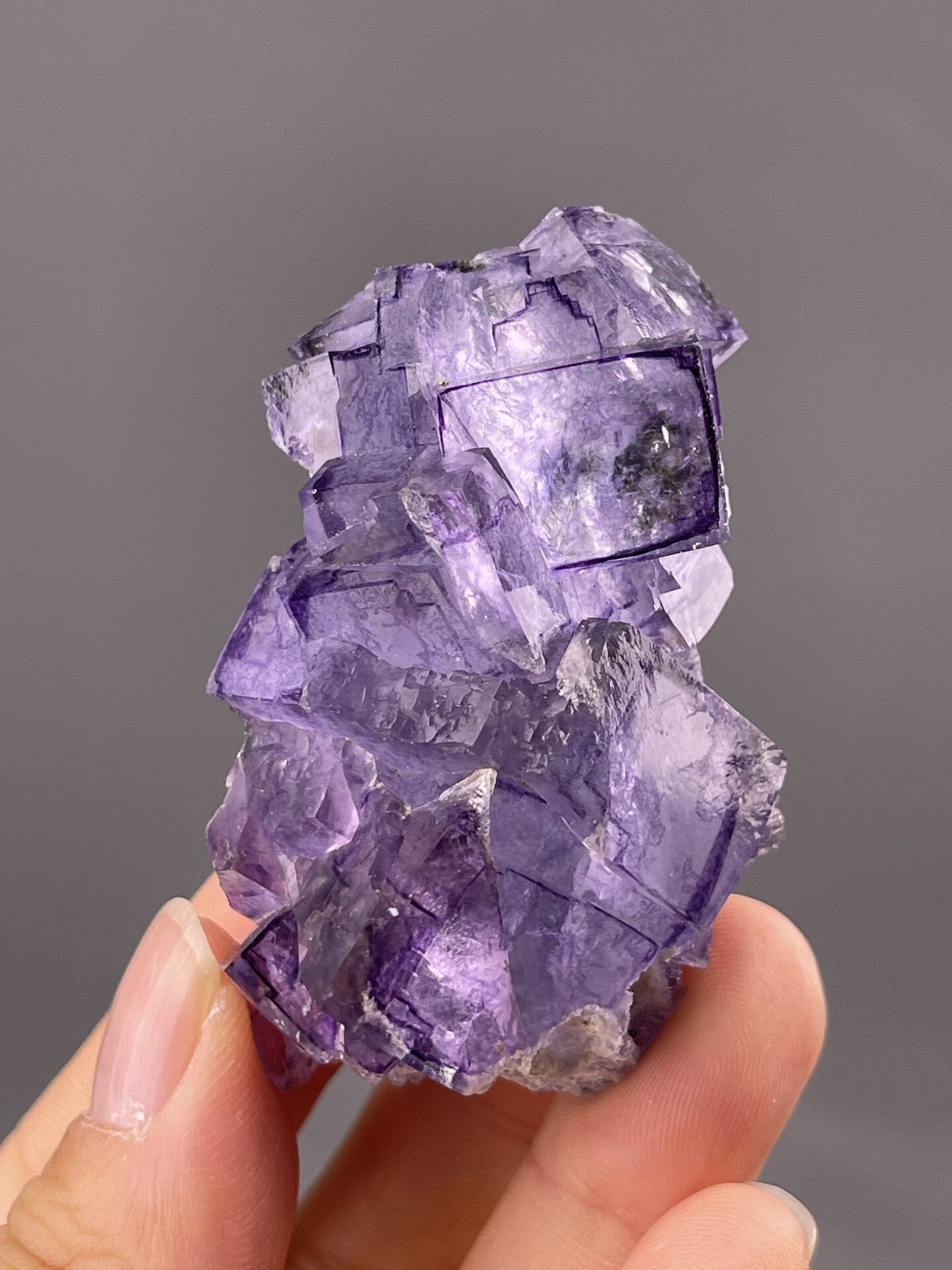 Well-formed phantom fluorite cube showing purple zoning, 2.8 g
