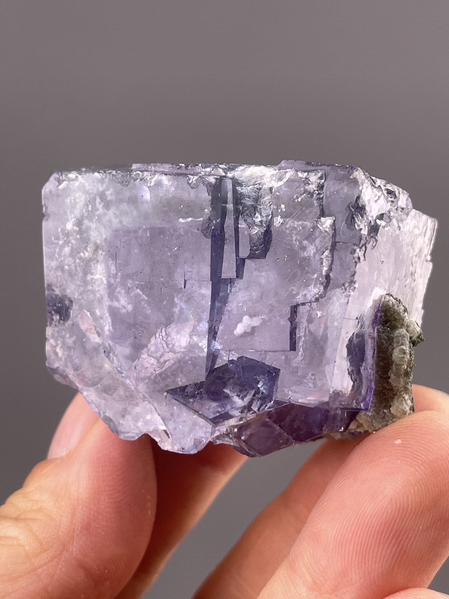 Miniature Fluorite Crystal from Yaogangxian Mine, China – angled view showing matrix