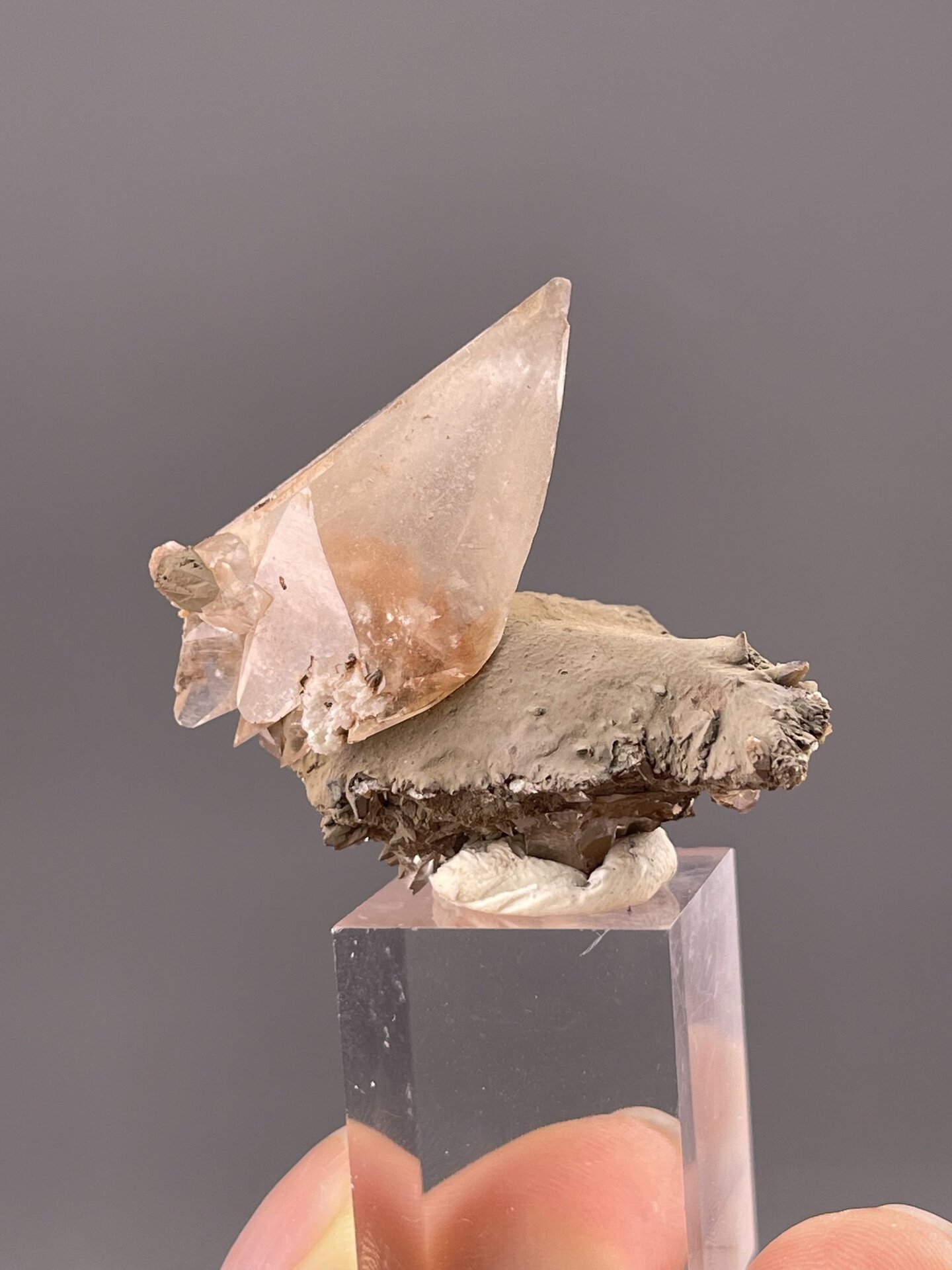 Close-up of calcite crystals showing reddish-pink colour