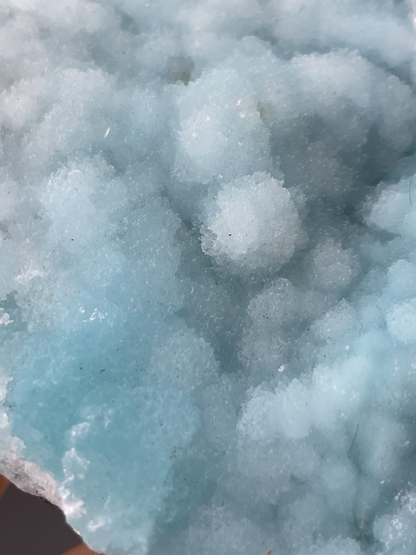 Detail of hemimorphite surface showing glassy translucent quality