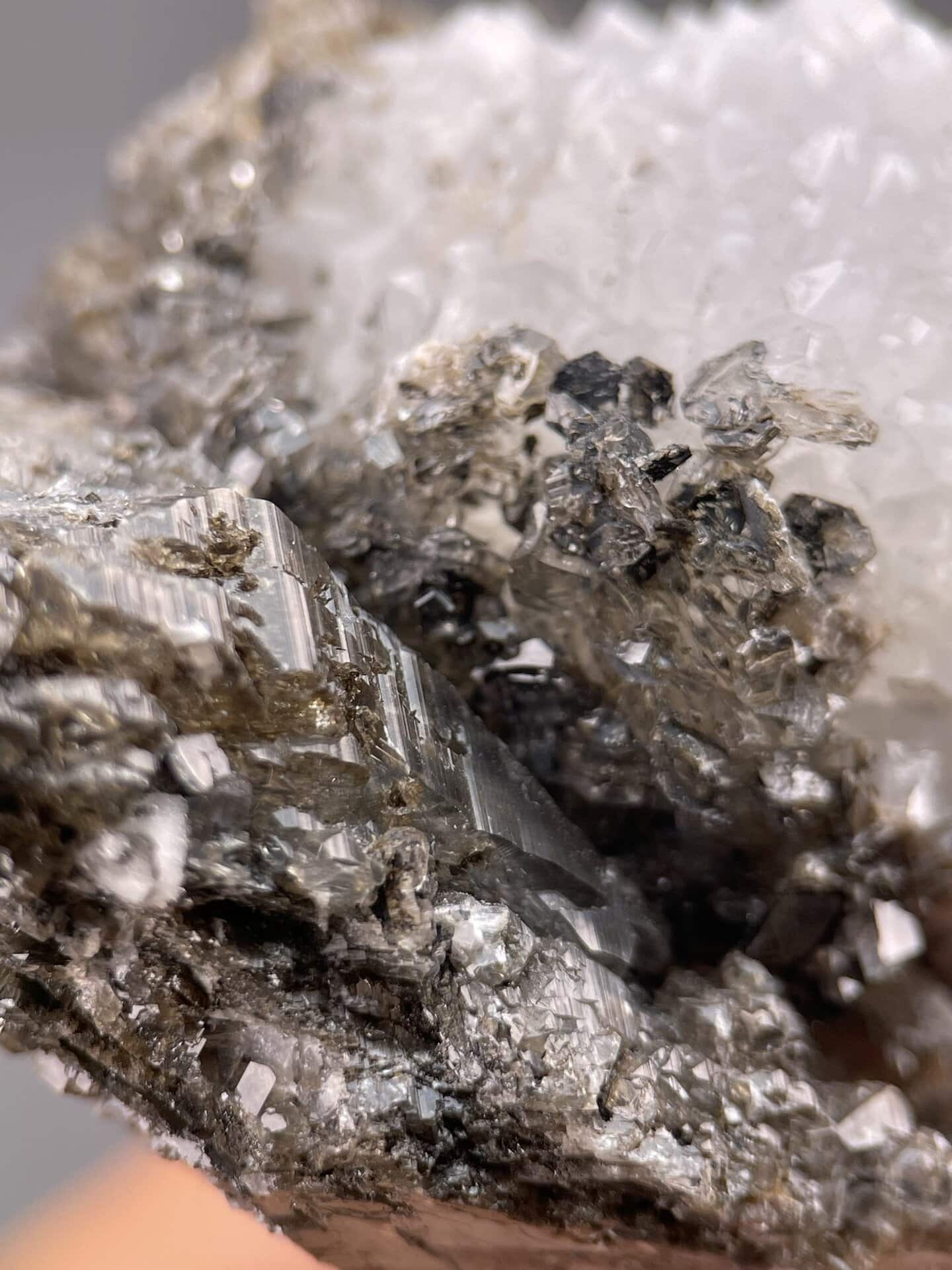 Angled view of Fujian calcite highlighting white druzy surface