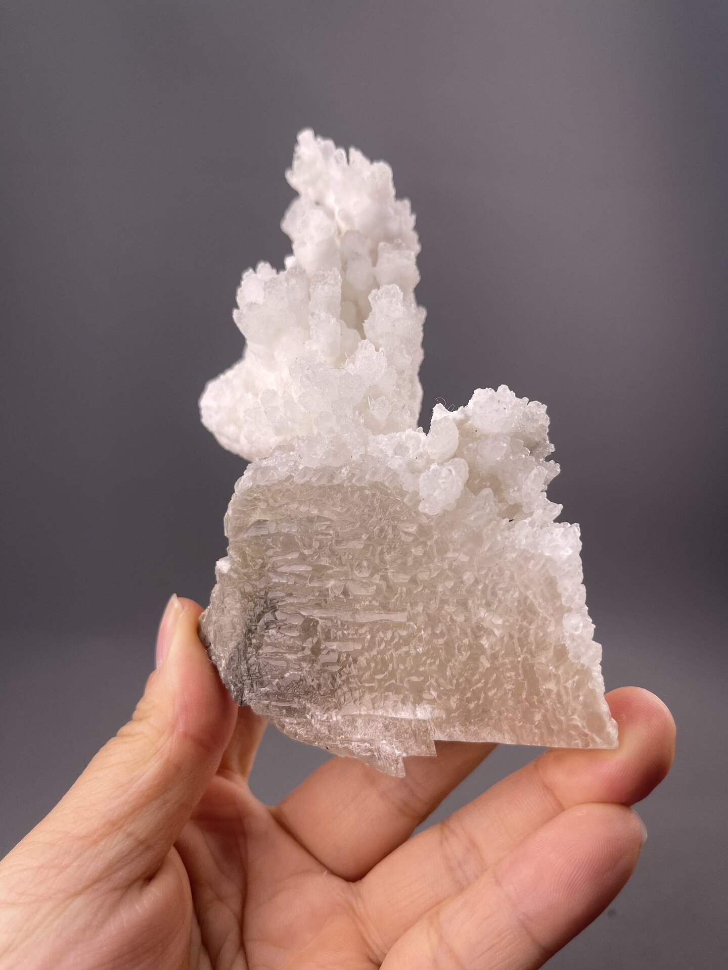 Calcite crystal sculpture showing intergrown rhombohedral forms, 7.9 g