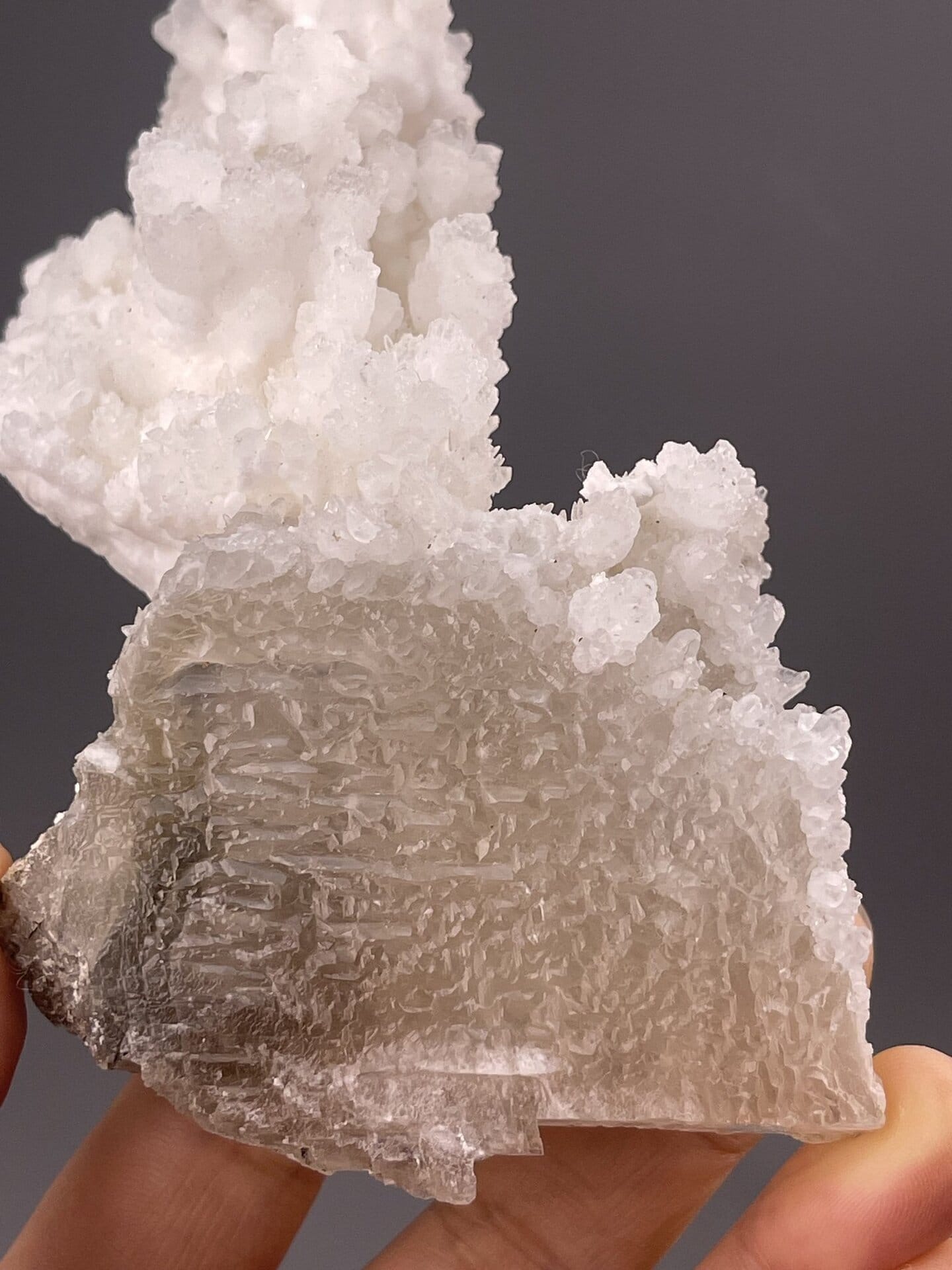 Close-up of calcite rhombohedral faces showing vitreous luster