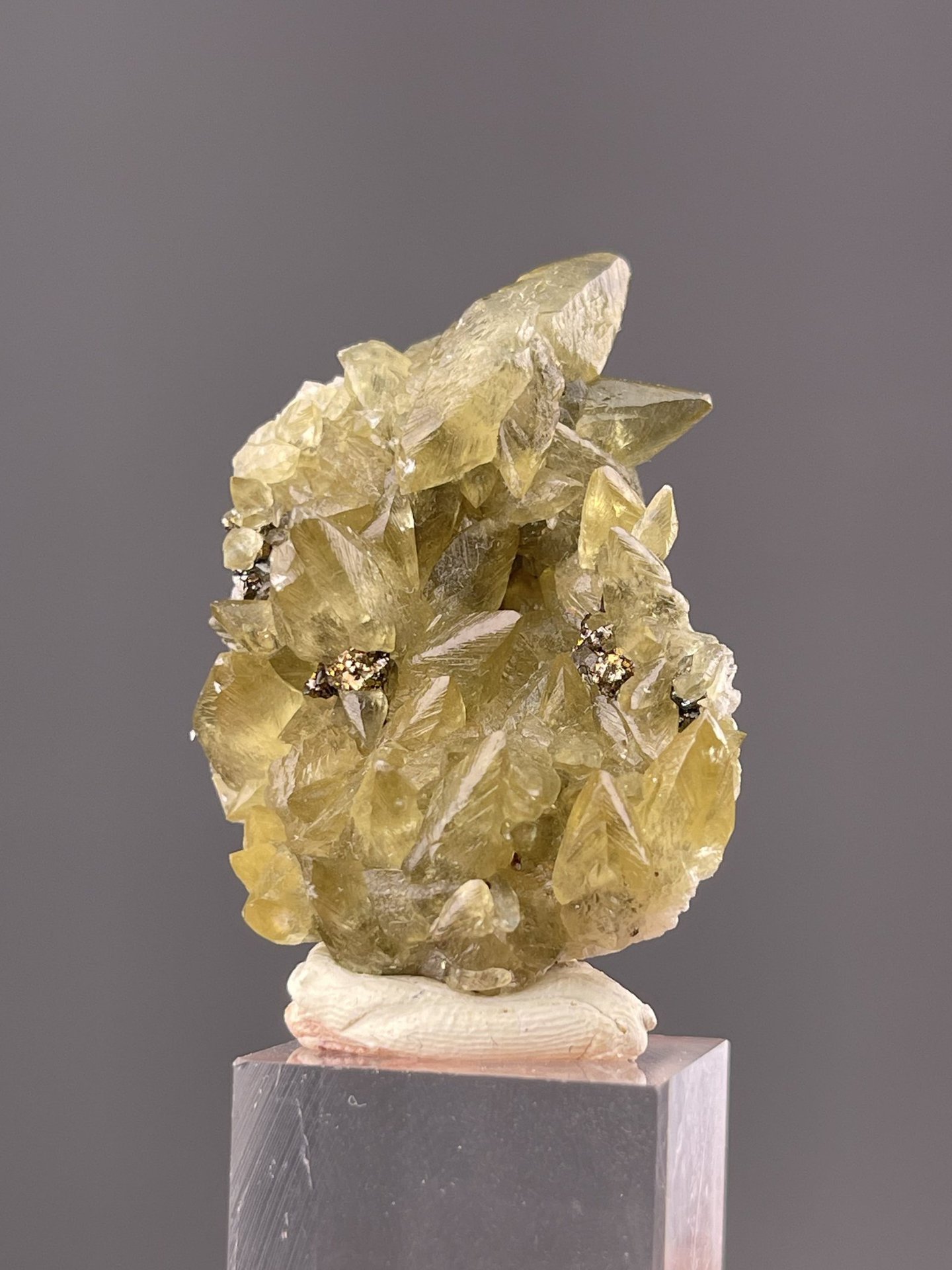 Detail of calcite crystal showing vitreous luster and yellow hue