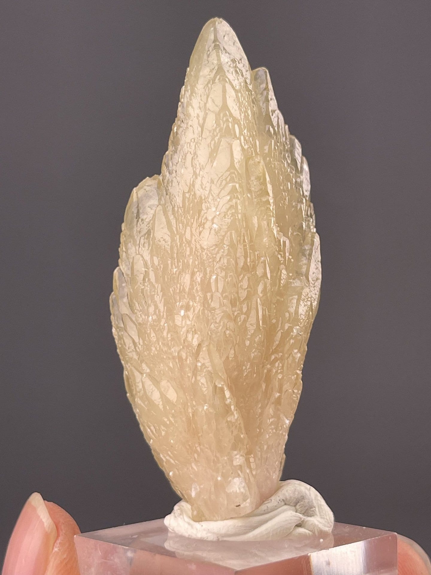 Angled view of Anhui feather calcite highlighting pale yellow colour