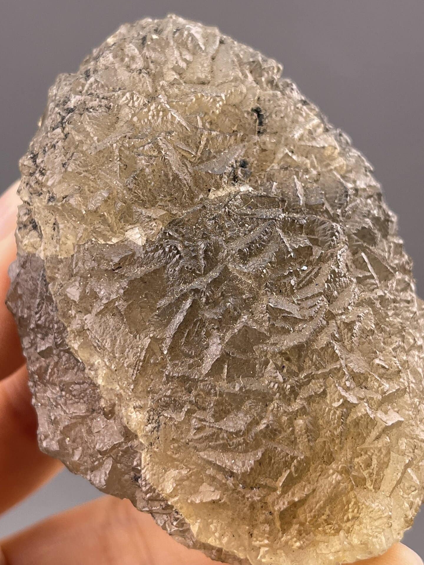 Detail of fluorite showing vitreous luster on yellow surface