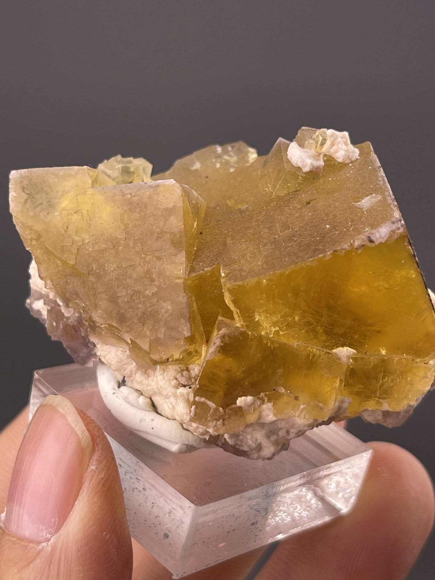 Side view of fluorite cube showing sharp crystallographic edges