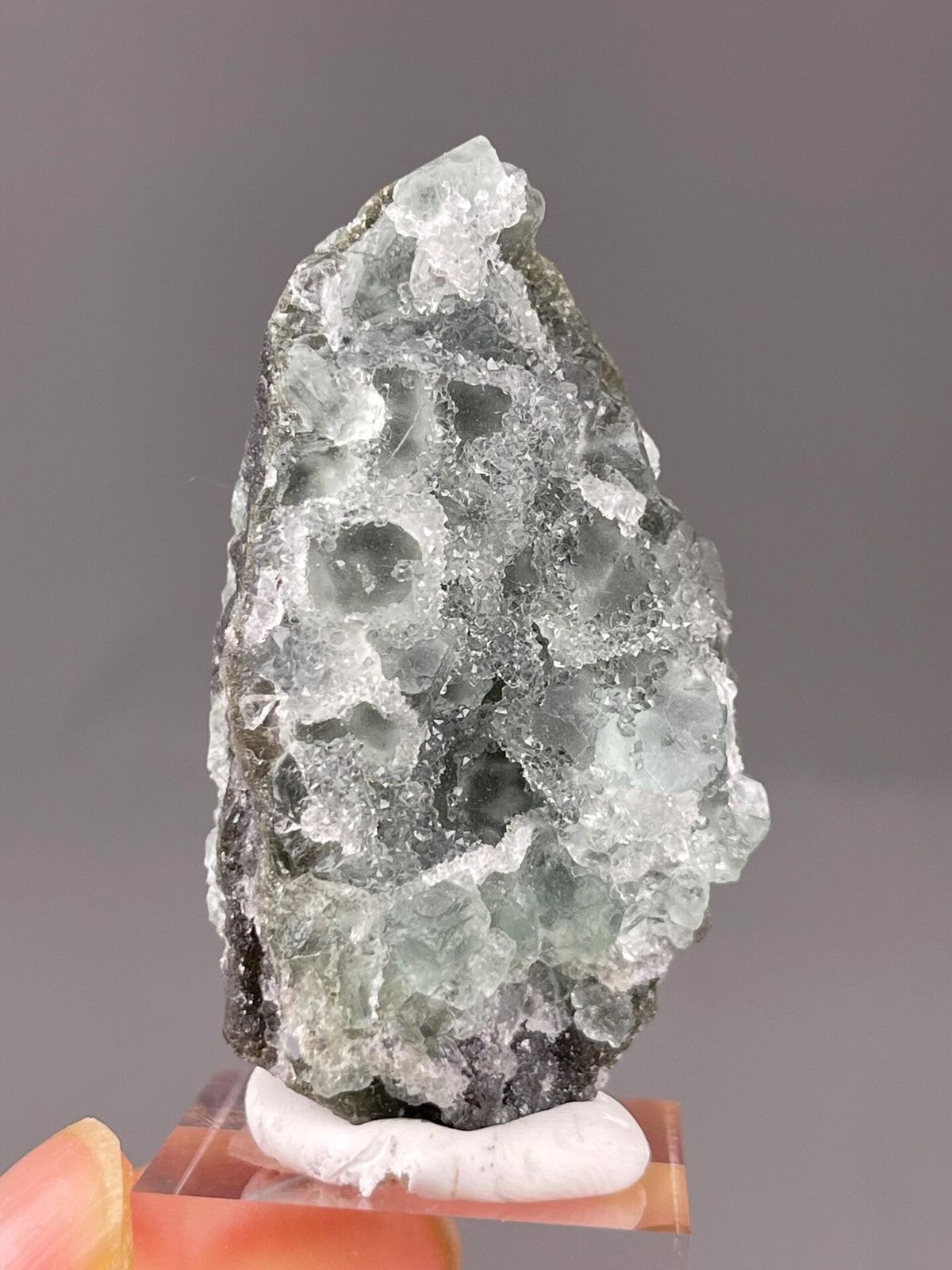 Front view of raw green fluorite with sugar-coated finish from Fujian