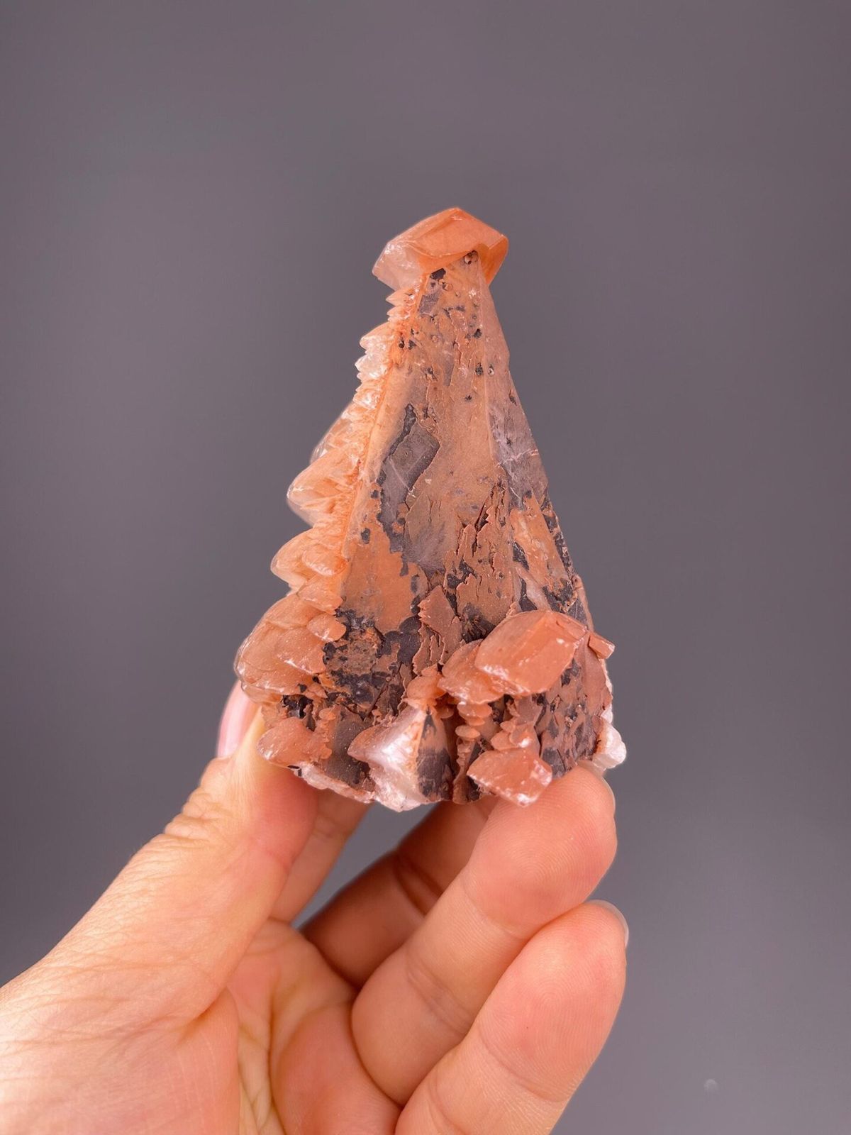 Red calcite scalenohedral tower from Daye Mine, Hubei