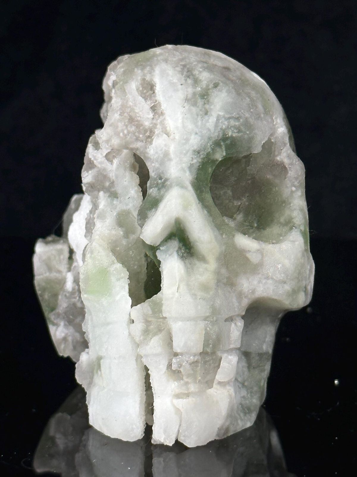 Front view of hand-carved green fluorite skull