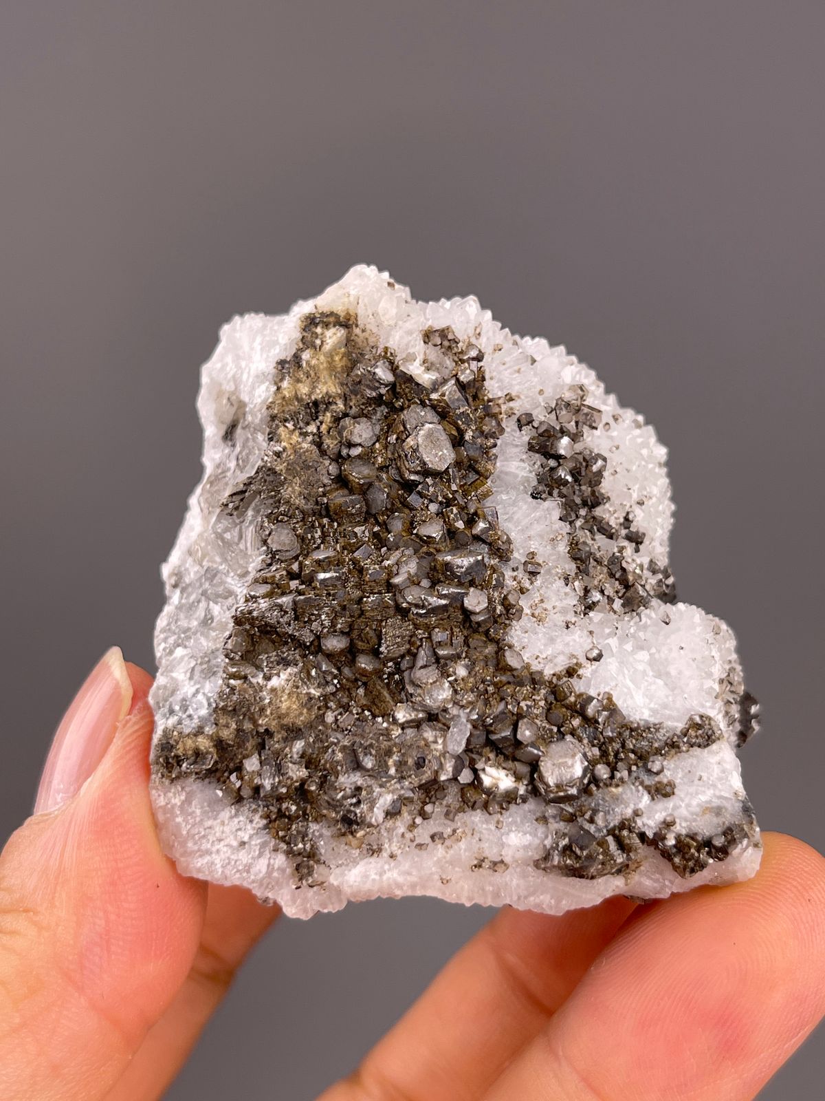 Calcite from Fujian, China: brown calcite crystals surrounded by white quartz.