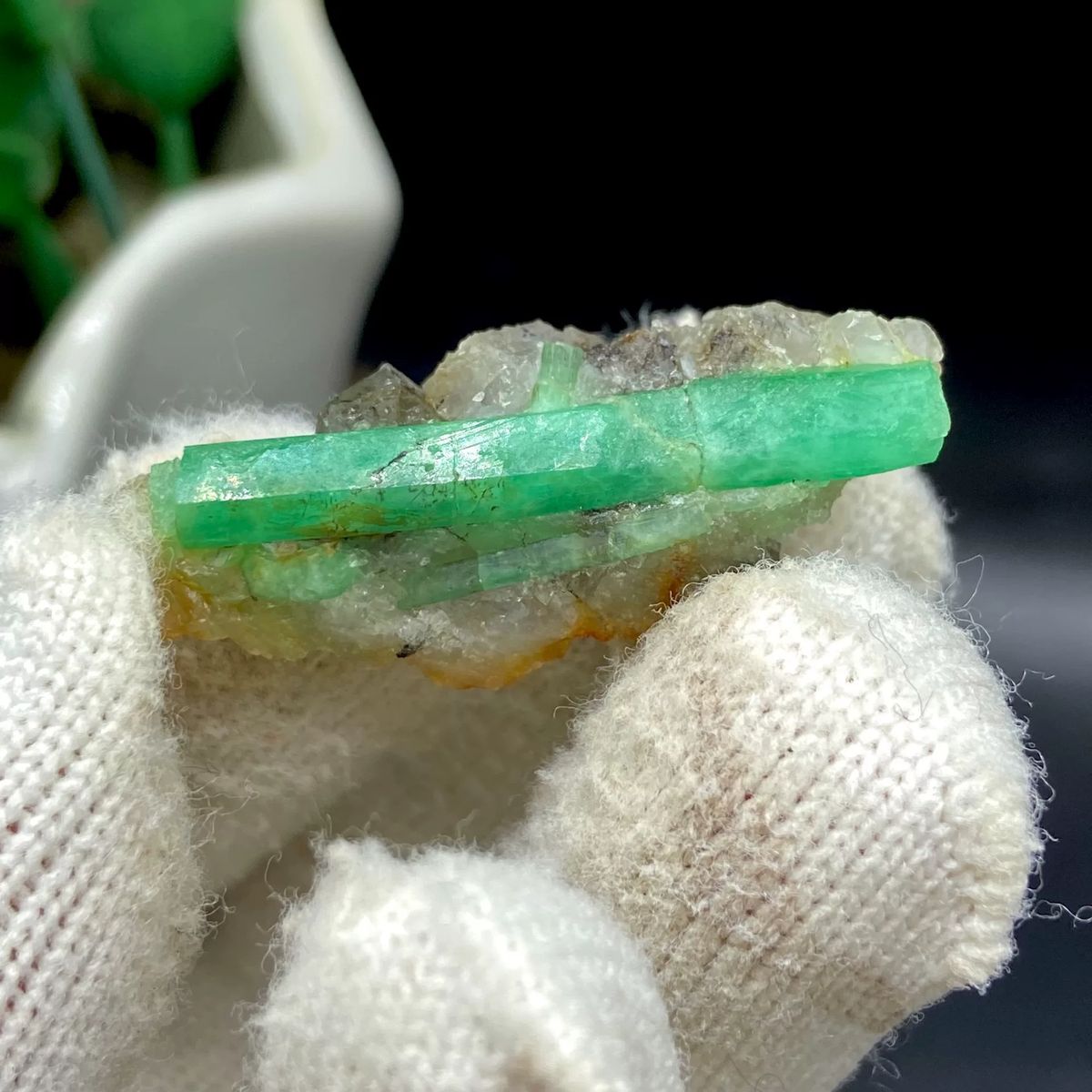 Green emerald beryl crystal on pale matrix from Yunnan — complete view