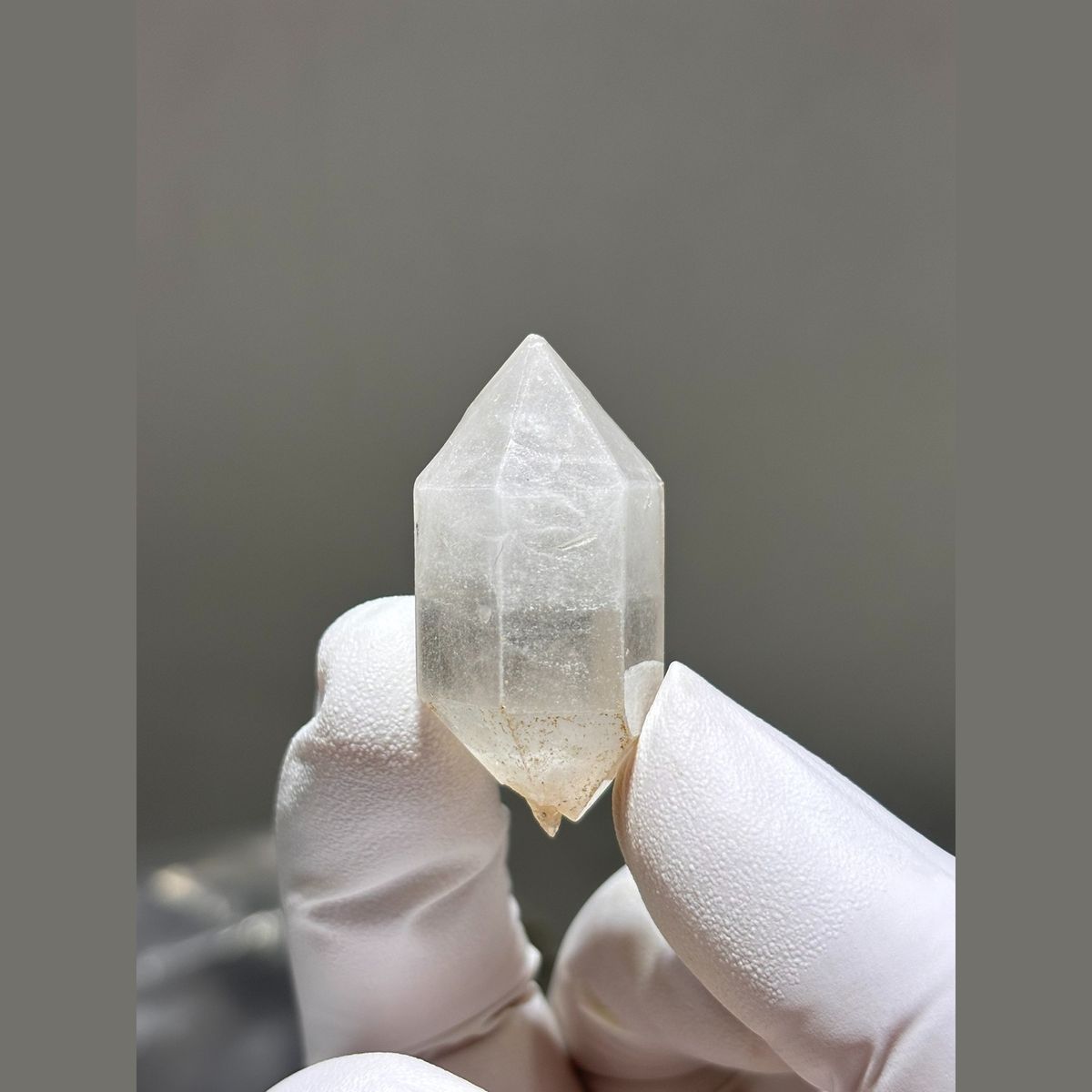 Double terminated quartz crystal with faint inclusions from Yunnan — complete view