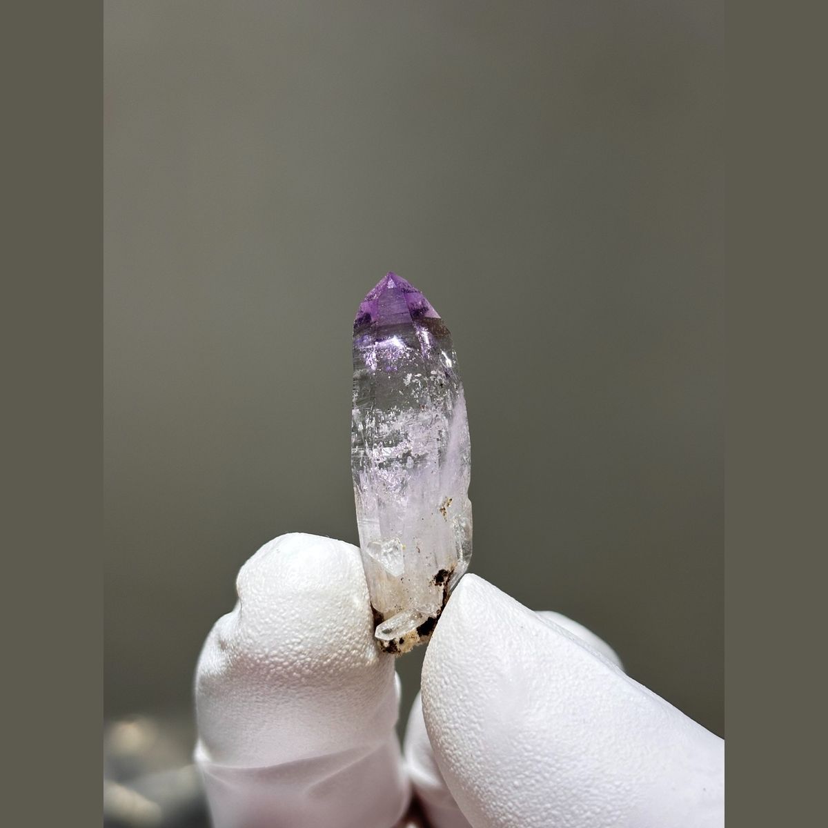Slender quartz with purple amethyst tip — complete view