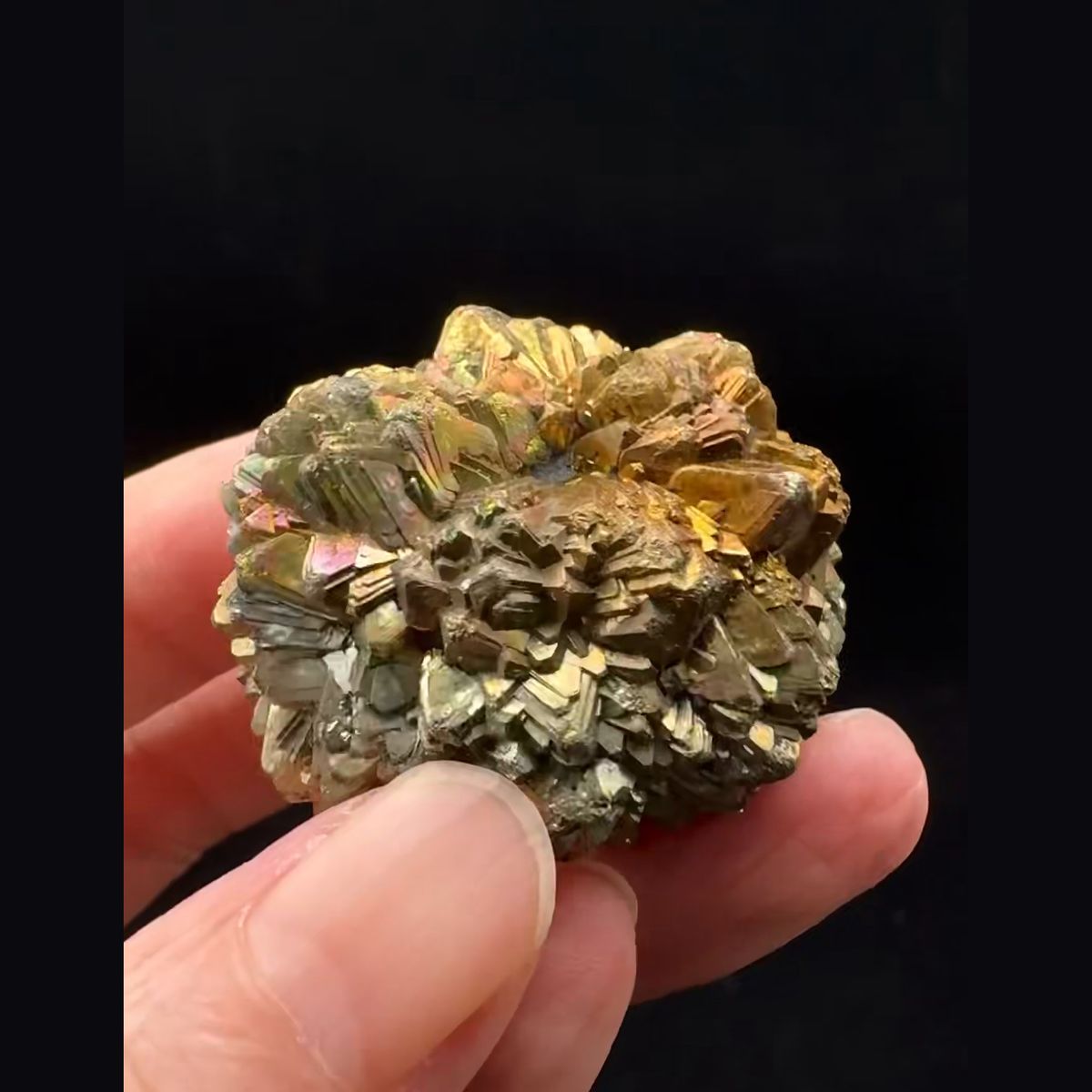 Round pyrite after marcasite ball with iridescent tarnish from Pakistan — complete view