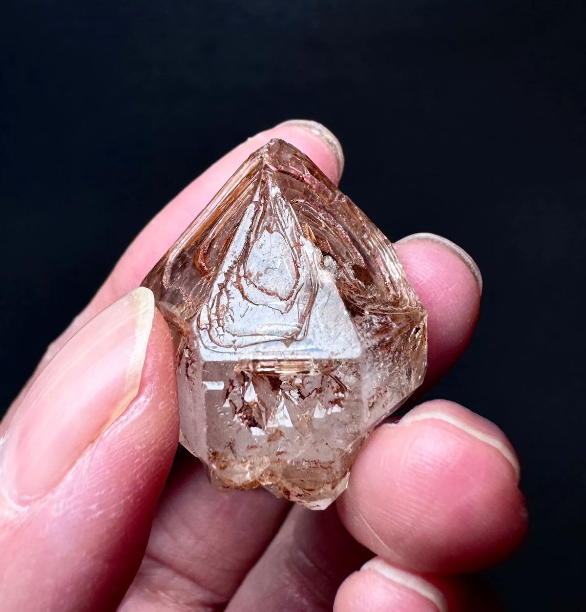Five-Window Red-Clay Skeletal Quartz Point — Madagascar — individual mineral specimen view 1