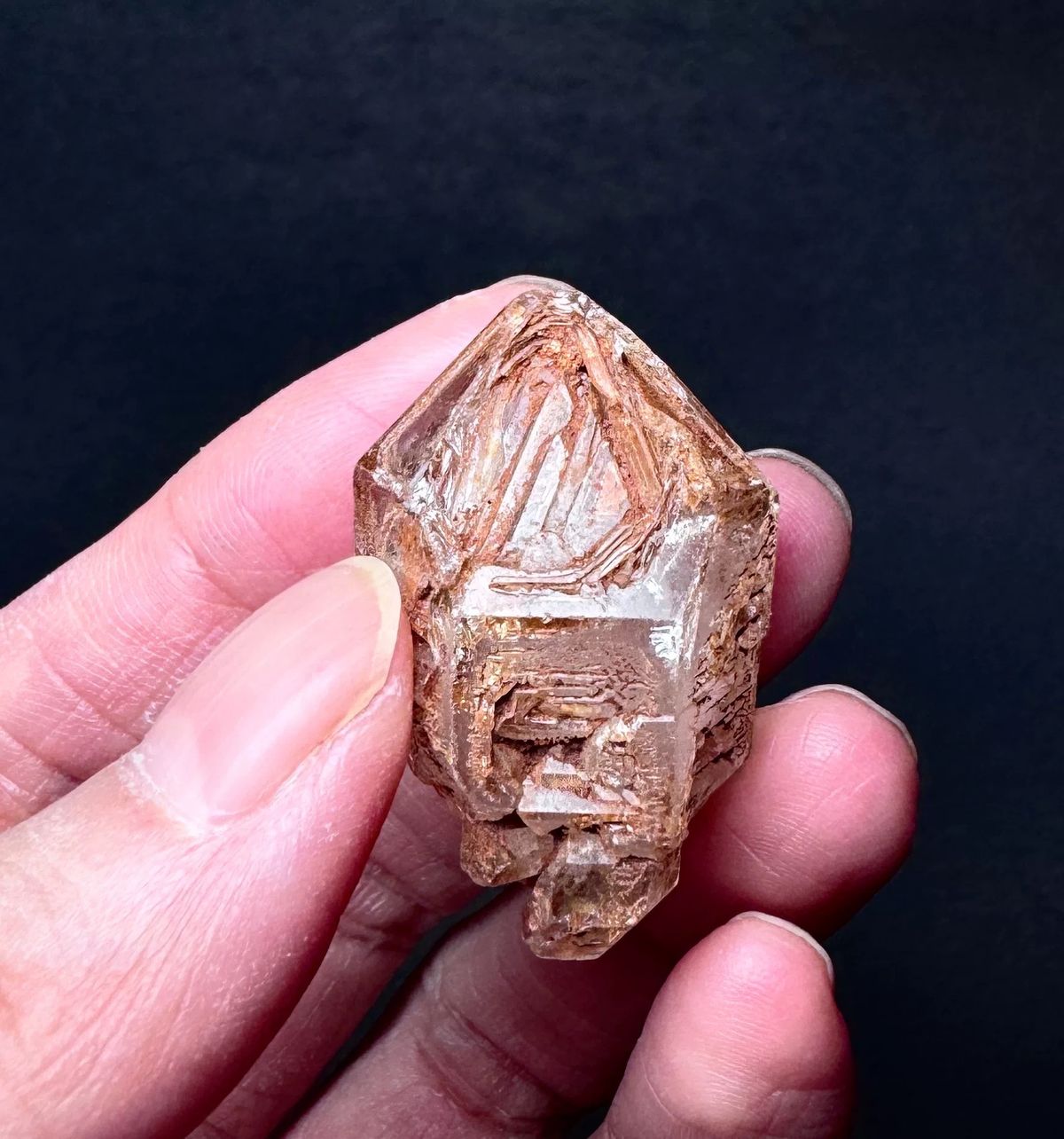 Stepped Red-Clay Skeletal Quartz Crystal — Madagascar — individual mineral specimen view 1