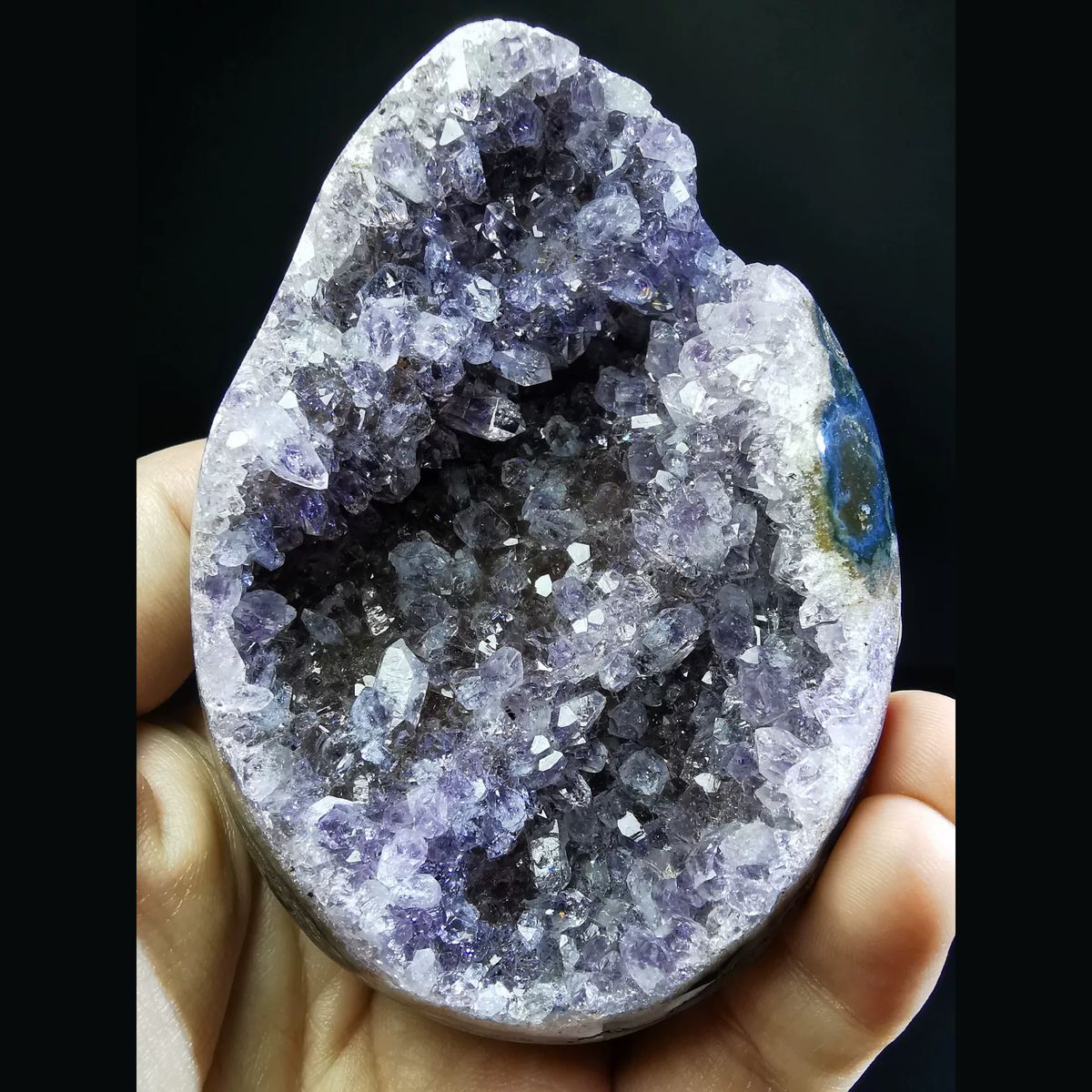 Deep Uruguayan amethyst geode with a blue agate rim — complete view