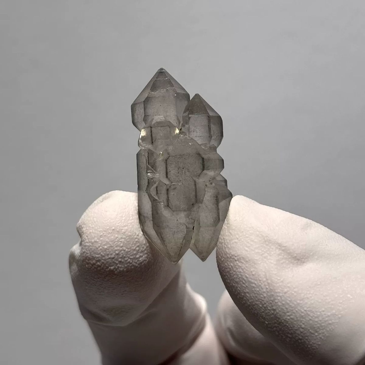 Yunnan quartz crystal with grey sketch-like inclusions — complete view