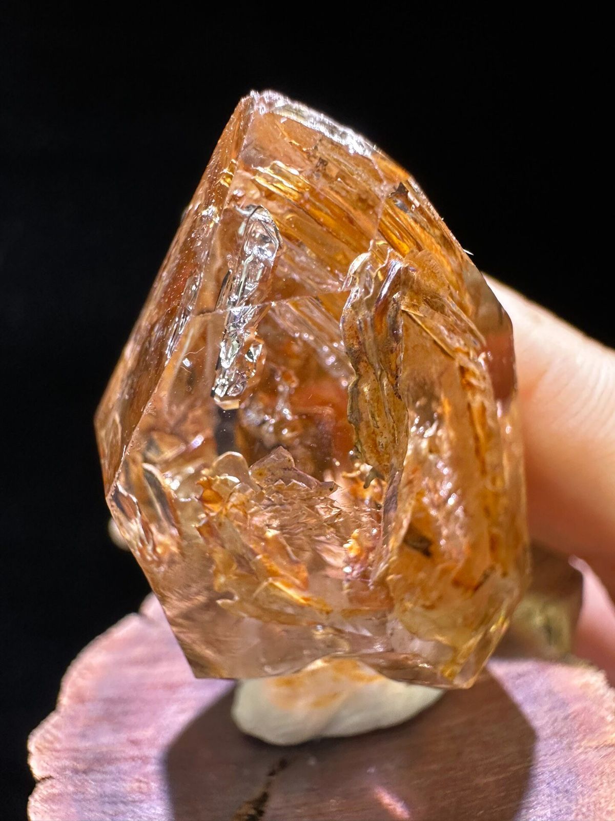 Rust-orange skeletal quartz scepter with clear facets from Namibia, specimen view 1