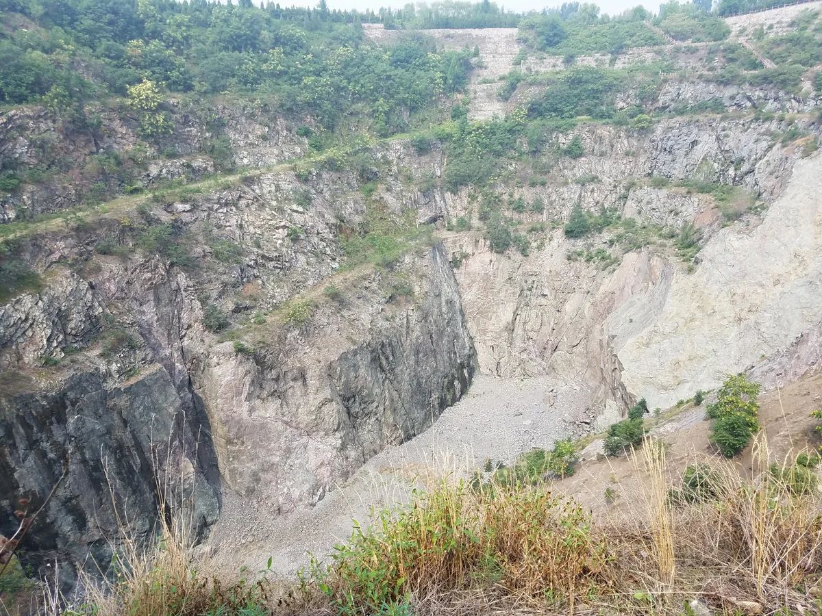 The depleted open-pit diamond mine at Mengyin, Shandong, China