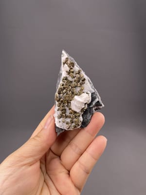 Golden pyrite crystals on calcite matrix, Tonglushan Mine, Daye, Hubei