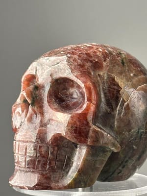 Hand-carved red garnet crystal skull front view