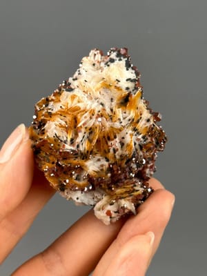 Front view of vibrant red vanadinite crystal cluster from Morocco
