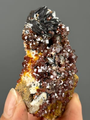 Deep red hexagonal vanadinite crystal cluster from Morocco