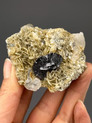 Cassiterite crystal with aquamarine and mica from Xuebaoding Mountain, Sichuan