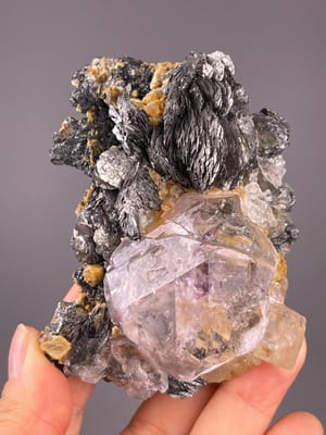 Fluorite with purple phantoms and marcasite blades from Inner Mongolia