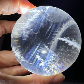 Blue Needle Quartz Sphere with Long Feathers and Snow Clouds
