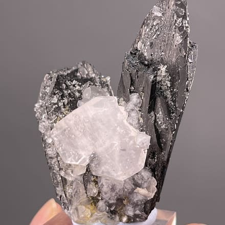 Black cassiterite crystals on white barite matrix, Yaogangxian Mine, Hunan