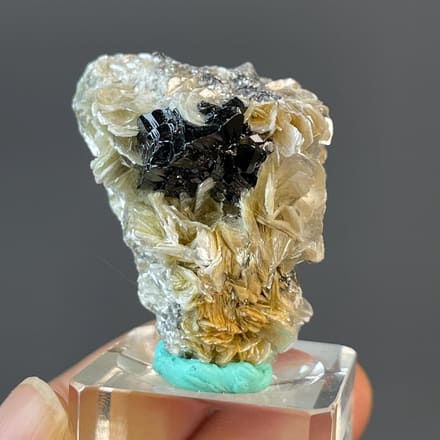 Cassiterite with mica from Xuebaoding mine, Sichuan, China