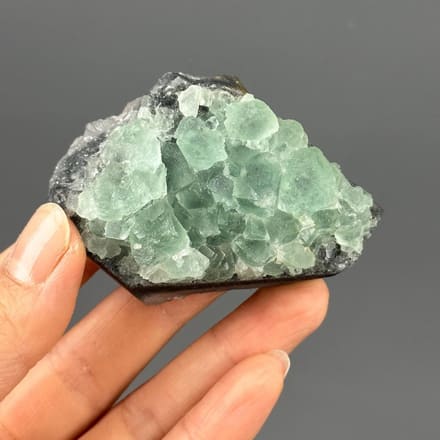 Green fluorite on quartz matrix front view