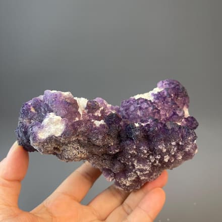 Fan-shaped purple fluorite on matrix from Guizhou, China