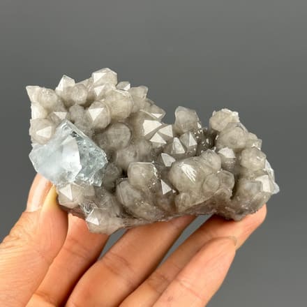 Blue fluorite on quartz matrix Hunan China front view